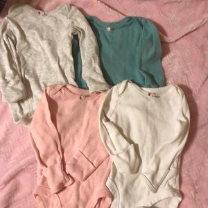 Bundle of 4 newborn onesies